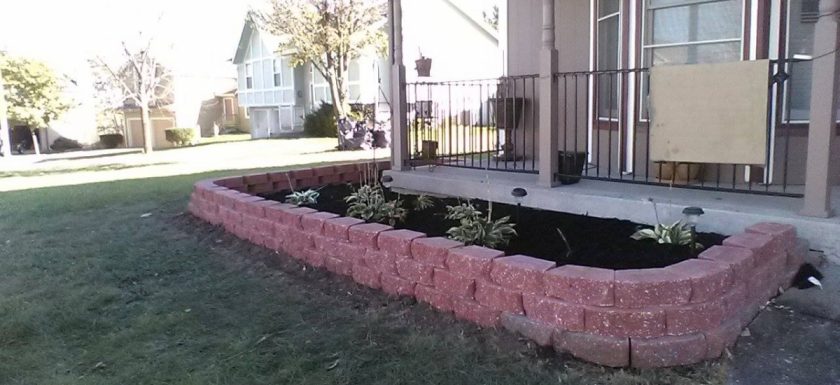 Customer wanted to add some curb appeal - so we created a flowerbed landscape.